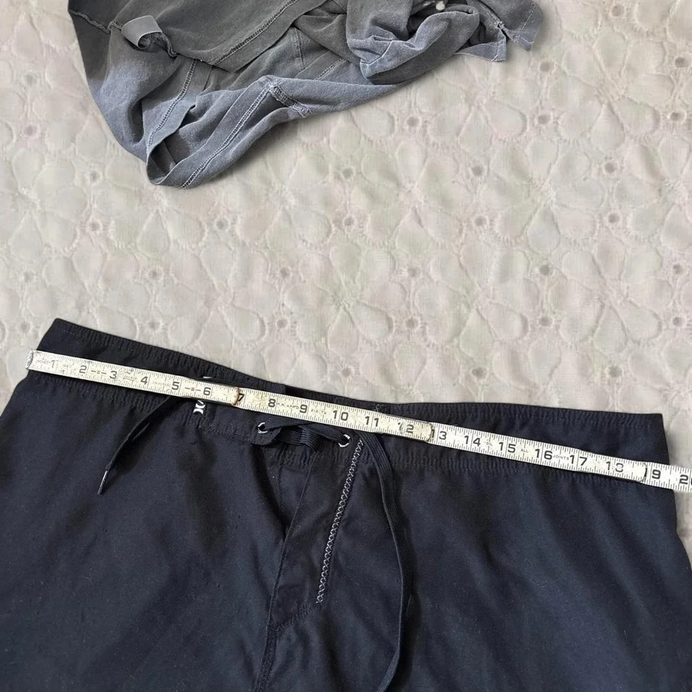 Hurley black and grey board shorts with gray side panels, size 38/XL